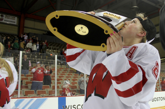 Ethan Magoc photo: Wisconsin assistant captain Geena Prough kisses the NCAA championship trophy on Sunday, March 20, 2011 at Tullio Arena.